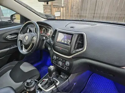 This black 2015 Jeep Cherokee 4x4 is ready for adventure, featuring a capable four-wheel-drive syste...