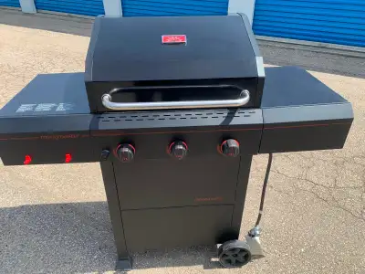 Megamaster (Home Depot) 3 burner propane grill. Very good condition, interior could use a bit more c...