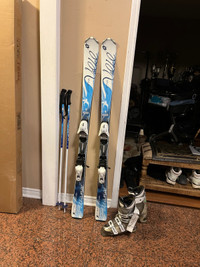 149 Salomon ski with boots , poles 