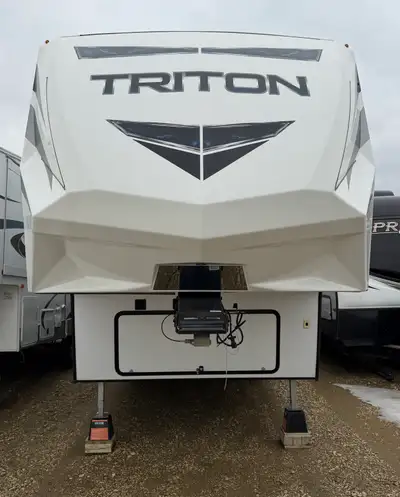 Up for grabs is our mint condition 2019 Triton tri axle toy hauler. - 42’ 11” long - 15’ garage - 3...