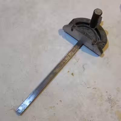 This one is all metal and functions as it should. It is a Craftsman, but will work on most table saw...