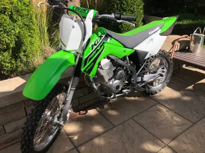Selling a great condition Kawasaki KLX 140r 1 owner dirt bike, bought brand new in the summer of 23...