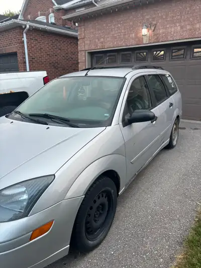 2004 Ford Focus SE 161,000km Runs and drives Needs front brakes/battery for safety Come and get it o...