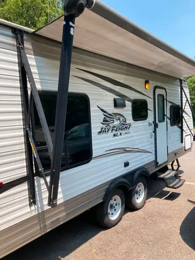 Well maintained Jayco couples trailer with double axle, air conditioning, furnace, queen size bed (n...
