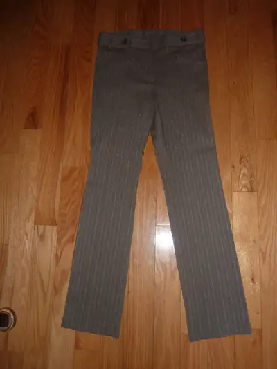 I have a pair of pin stripe taupe Robert Kitchen Canadian Designer Made in Canada Pants. Size is 4....