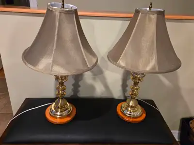 Pair of matching brass table lamps with light green shades, View more