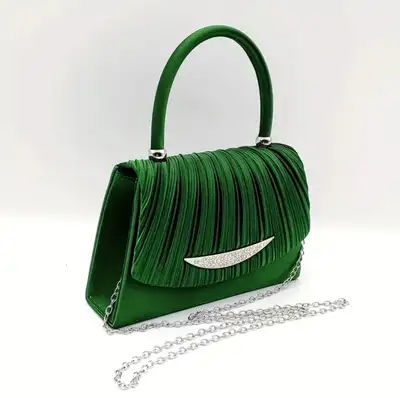Add a touch of elegance to your ensemble with this stunning Emerald Green Evening Bag, perfect for a...