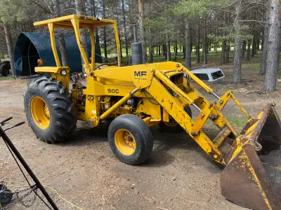 Front end loader runs good could use a little work steering is pretty loose but still works needs ne...