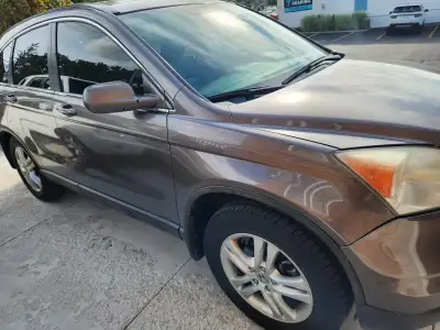 SELLING DRIVABLE 2011 HONDA CR-V EX-L AS IS - Two sets of tires on rims. OEM & Steelies. Brand new S...