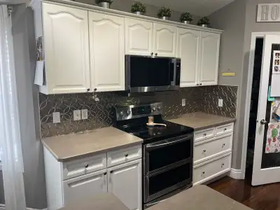 Kitchen cabinets and island, View more