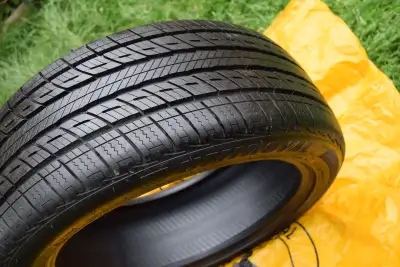 4Like new 235/45r18 94V Uniroyal Tiger Paw All-Season Tires with 99% treads please see the pictures...