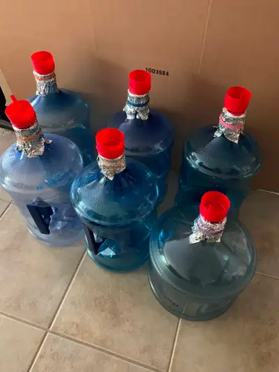 6 Water Jugs : Each are 11 Litres .... Used once ... Clean ... Smoke free ... In excellent condition...