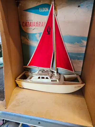 Eldon Catamaran from the early 60's in its original box. No broken or cracked pieces and stored care...