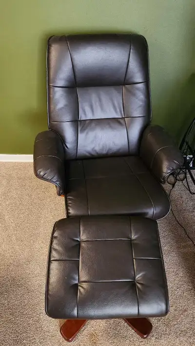 Leather recliner and ottoman , View more