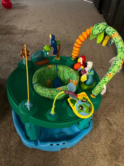 Evenflo ExerSaucer Jungle Activity Center – $30, View more
