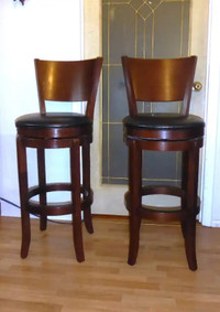 Two- Like new Swivel Counter Barstools.