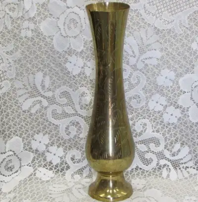 Pick up in Noelville. Delivery/Shipping also available. Footed vase with a flared rim and overall et...