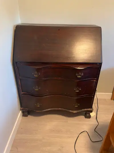 Antique dresser with secretary desk top. A few small scratches but works well, we just don't have ro...