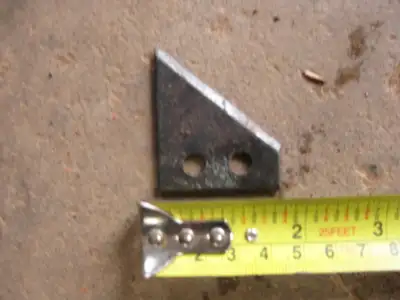 Cutter blade- 1 1/2" wide x 1 1/2" tall with sharpened bevelled cutting edge. Have two 1/4" holes fo...