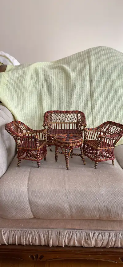 Vintage 4 piece multicoloured wicker doll furniture set. Due to age (over 90 yrs) sofa legs are dama...