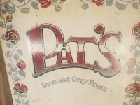 Pats rose and grey sign