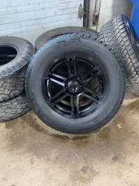 275/65/18 Blizzak tires on RTX wheels off a 14 Ford F150