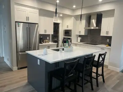Newer home (6 years old 2,300sq.ft.) in the lake community of Mahogany. Two furnished rooms availabl...