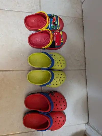 Kids Crocs in good used condition. Lightning McQueen junior size 1. Lime colour also junior size 1....