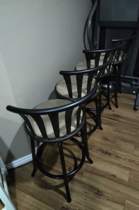 4 used swivel counter stools