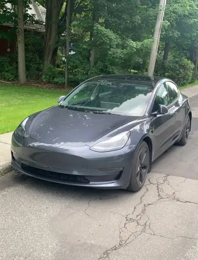 $35,000$ firm 2022 Tesla Model 3