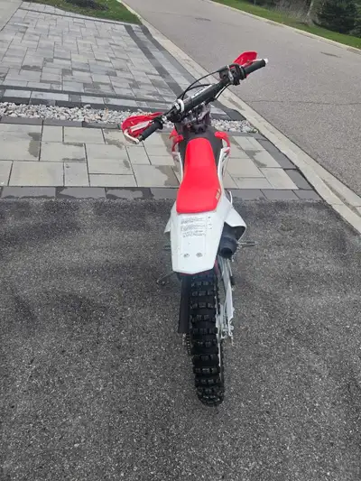 Awesome Honda CRF125F dirt bike. Has electric start and kick start too. Starts easy, no broken beari...