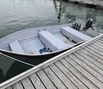 9ft aluminum boat with 4hp Mercury outboard. Engine has approx. 30hrs. Does not have a trailer