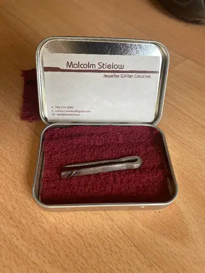 This is a lovely rare tie-bar or clip by artist Malcolm Swetlow. It is made of forged and soloured t...