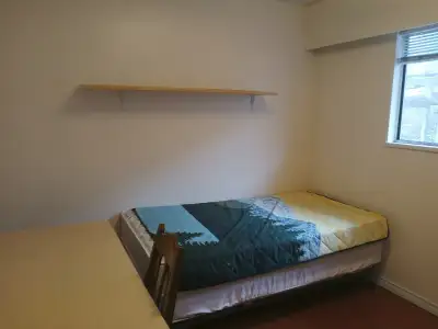 Room is a good size partially firnished with closed space and drawers. shared bath and kitchen