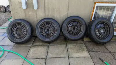 used 4 Yohohama Ice Gaurd rims and tires 205/65R 16