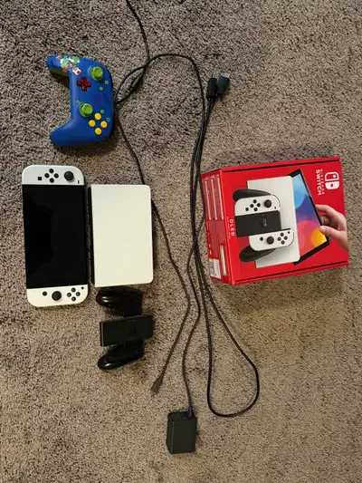 Nintendo Switch OLED (White), View more