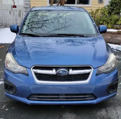 2014 Subaru Impreza Automatic that also has paddle shifters. All wheel drive Heated seats Remote sta...