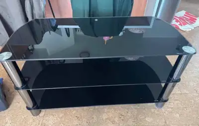 44” TV + Black Tempered Glass TV Console – $100, View more