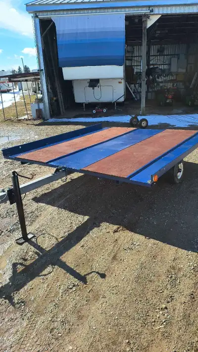 Rebuilt snow mobile or utility trailer. All new paint underneath and top. New axle, good tires, new...