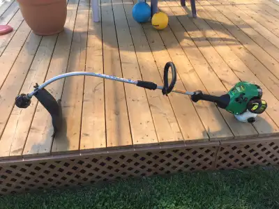 Weed Eater grass trimmer, View more