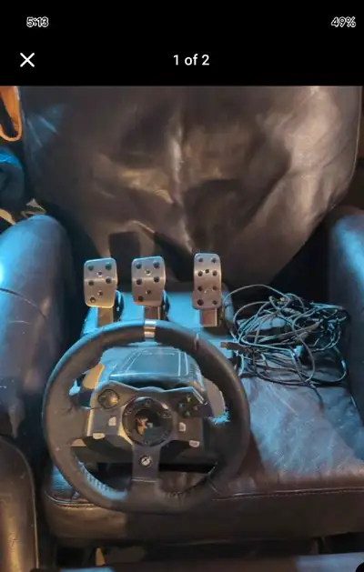 Logitech steering wheel and pedals, View more