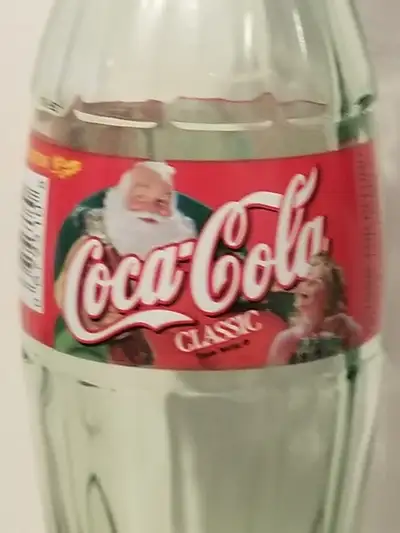 CHRISTMAS STYLE COKE BOTTLE FROM 1999, View more