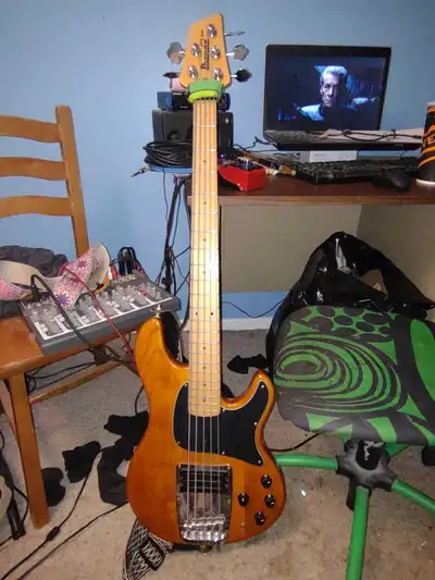 For trade for a 6 string bass is my Ibanez ATK bass guitar, a real workhorse with a powerful sound....