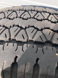 Goodyear wrangler tire and rim. 255/70r16