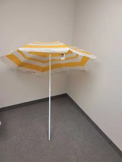 Beach Umbrella moving out, View more