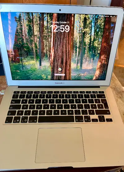 Macbook Air running Sequoia, View more