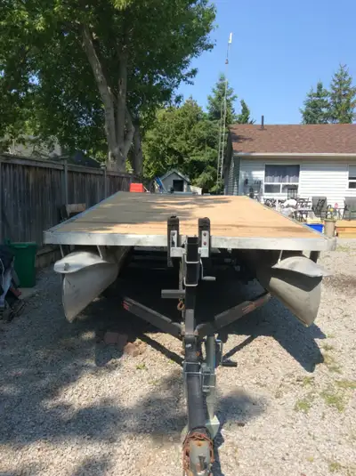 18' Pontoon boat. Aluminum Pontoons are 20" in diameter, in good condition, no leaks. Has new Marine...