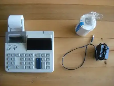 Calculatrice à ruban Texas Instruments (comme neuve), View more