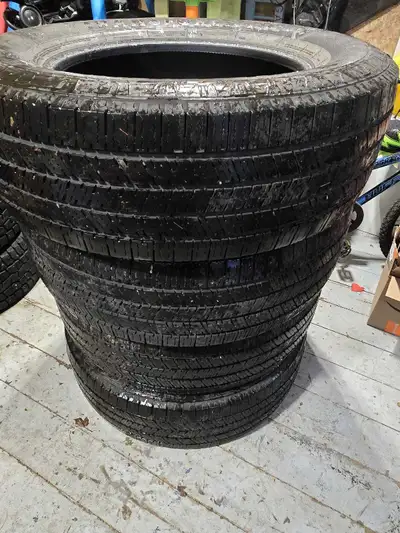 Selling a set of used Transforce LT275/65R20 tires, including both winter studded tires and summer t...