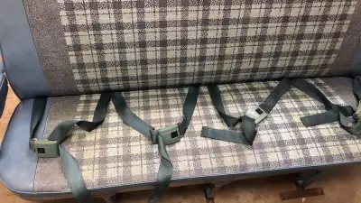 Full size van seat for older GMC van. Has 4 working seat belts. Comes with boards and bolts.. $250 o...